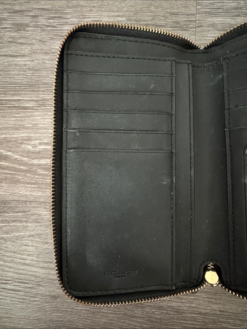 Coach Black Pebbled Leather Zip-Around Wallet with Gold Logo